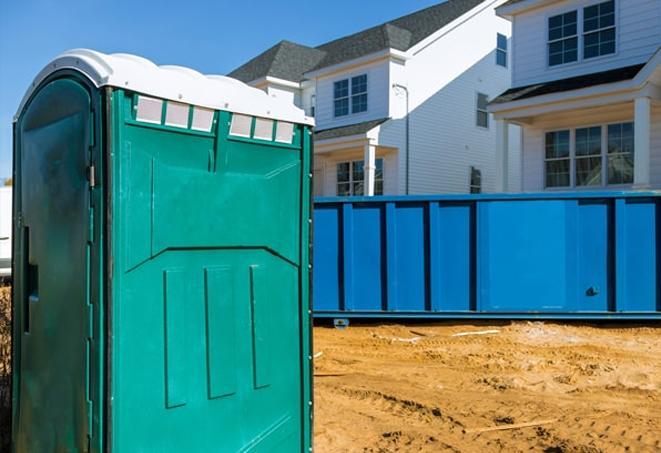 toilets on wheels, making life easier for workers at a busy construction site